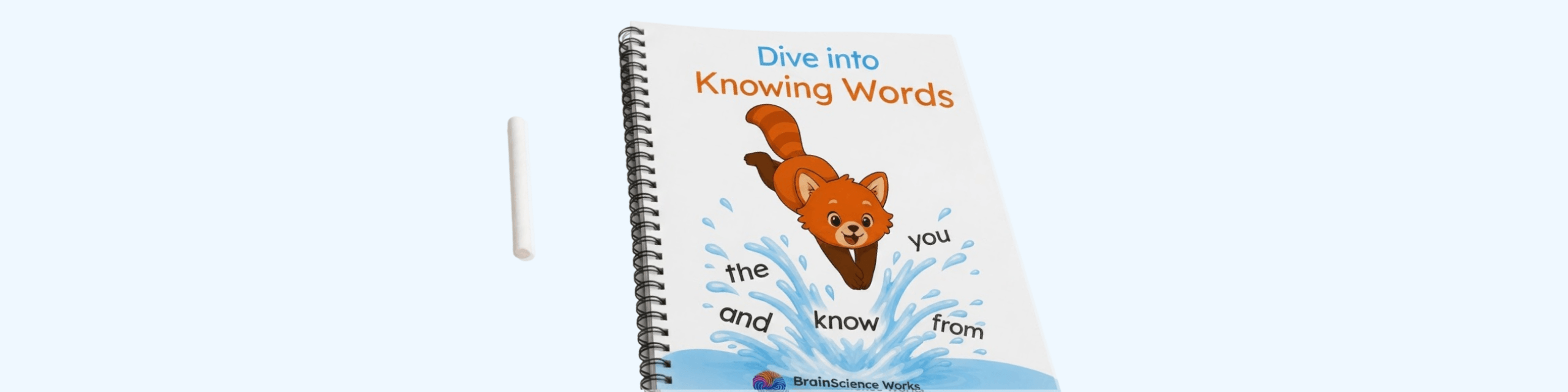 The Knowing Words workbook lying next to clay tools