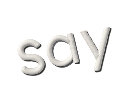 Clay letters spelling 'say'
