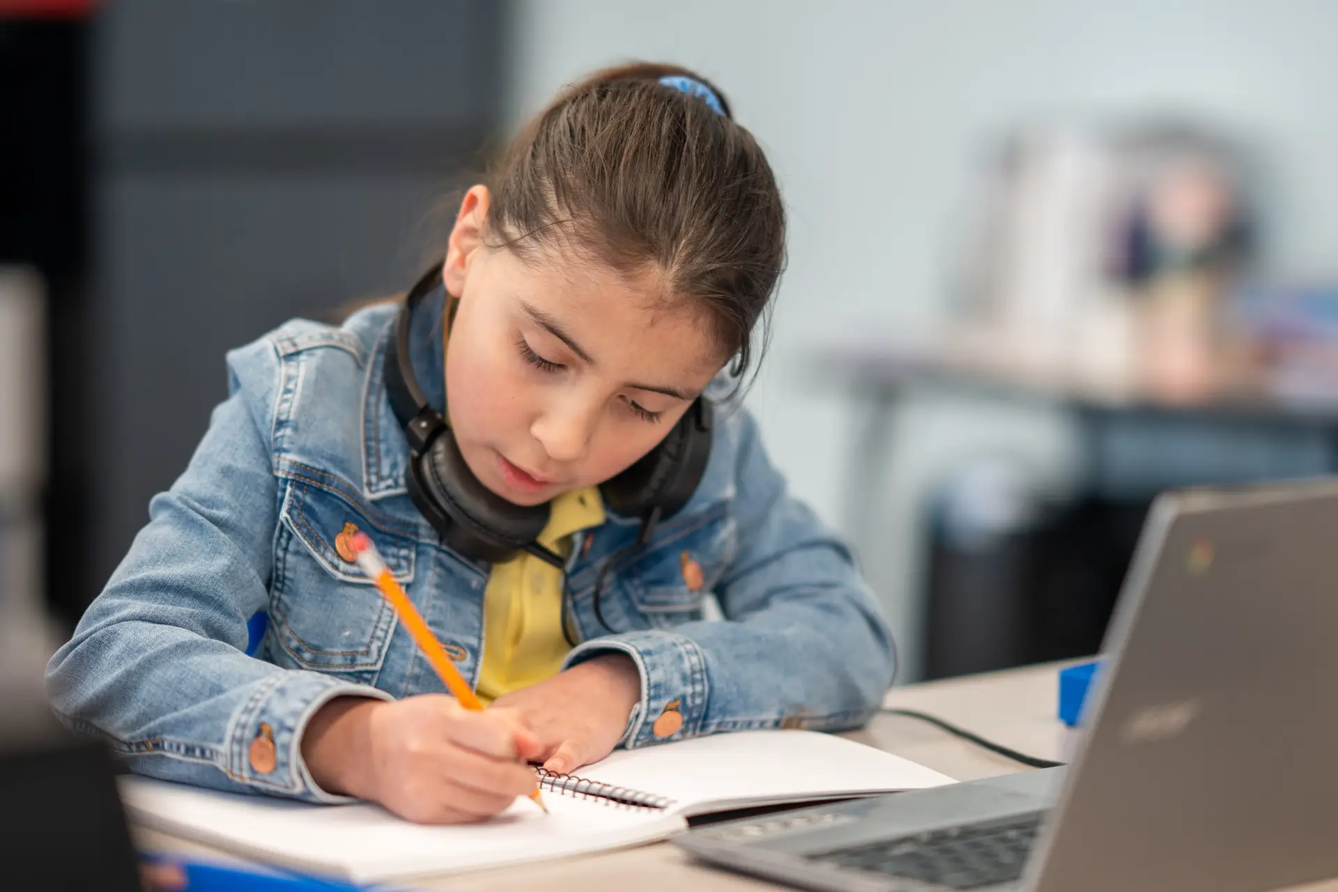Growing Words – girl writing and studying